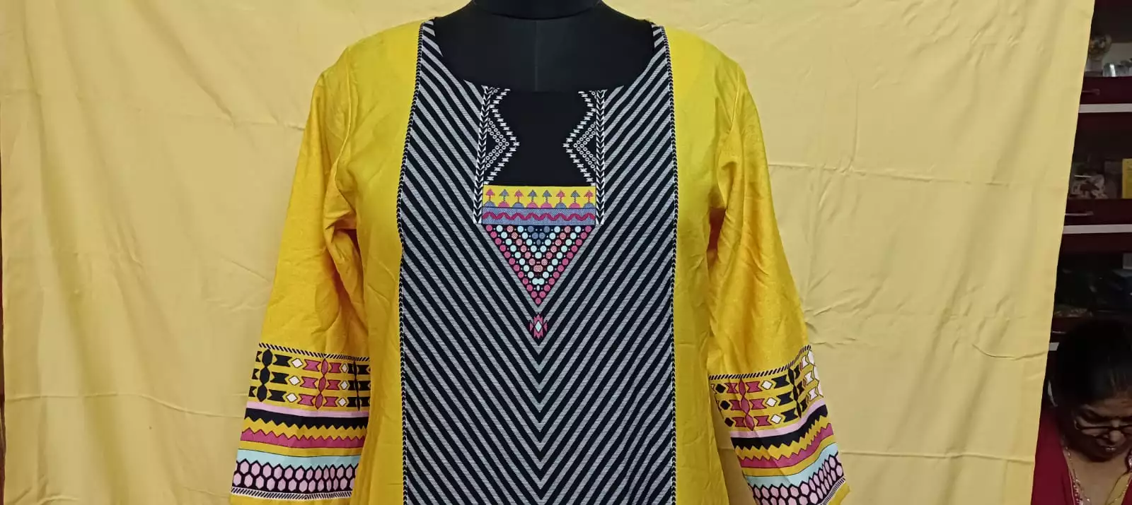 Shoplaila yellow kurti with black contrast design